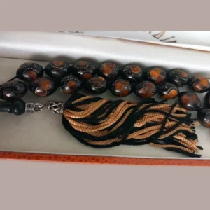 Κομπολόι Γιουσουρούμ με κεχριμπαρένιες χάντρες σε δερμάτινη κασετίνα